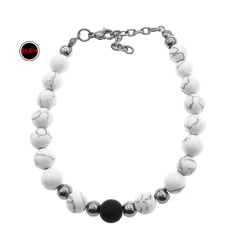 CUENTAS MARMOLADAS UNA NEGRA Y BOLITAS DE ACERO QUIRURGICO 22+3CM PULSERA