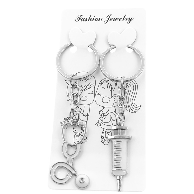 ESTETOSCOPIO Y JERINGA PARA COMPARTIR LLAVERO